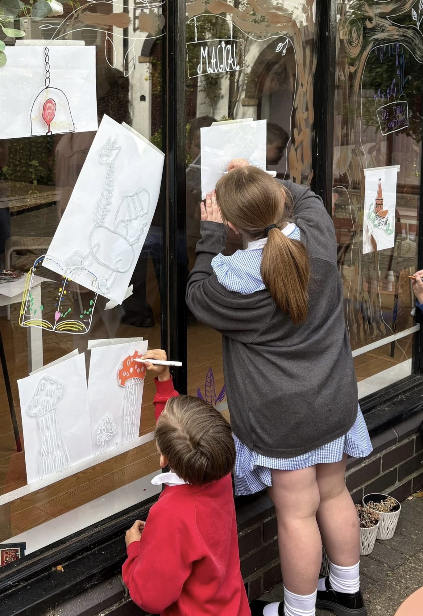 Young people creating artwork on the trail
